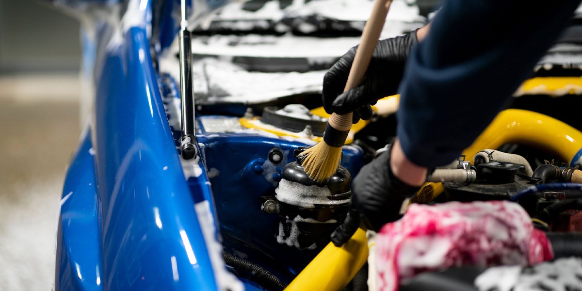 degreasing the engine by using degreaser